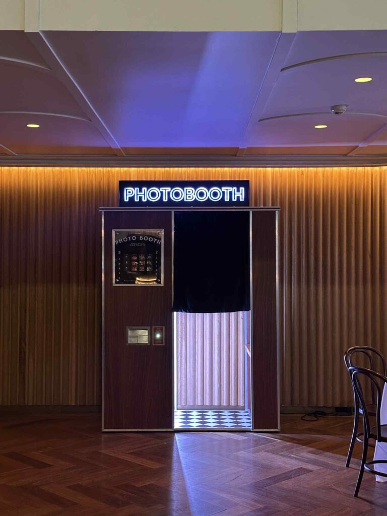 Retro enclosed photo booth at Cloudland Brisbane with vintage design and custom branding